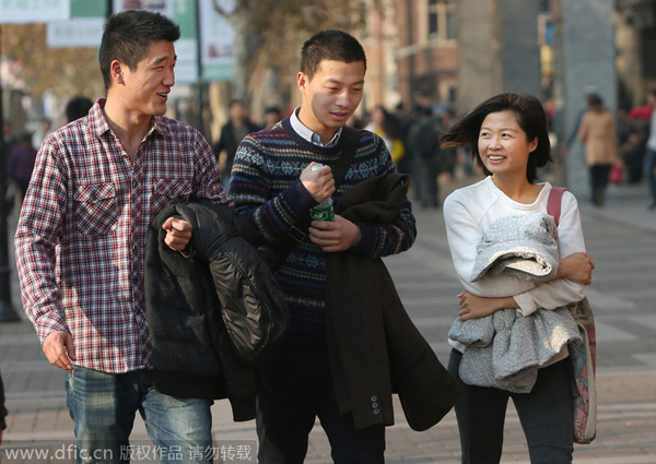 Shanghai, Nanjing heat up just before predicted cold