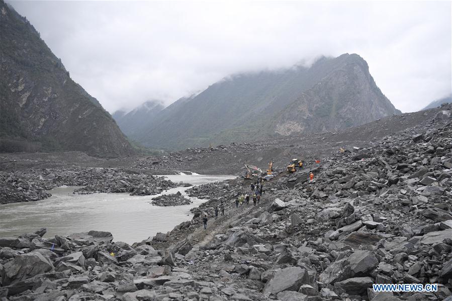 Rescue work underway after SW China's devastated landslide